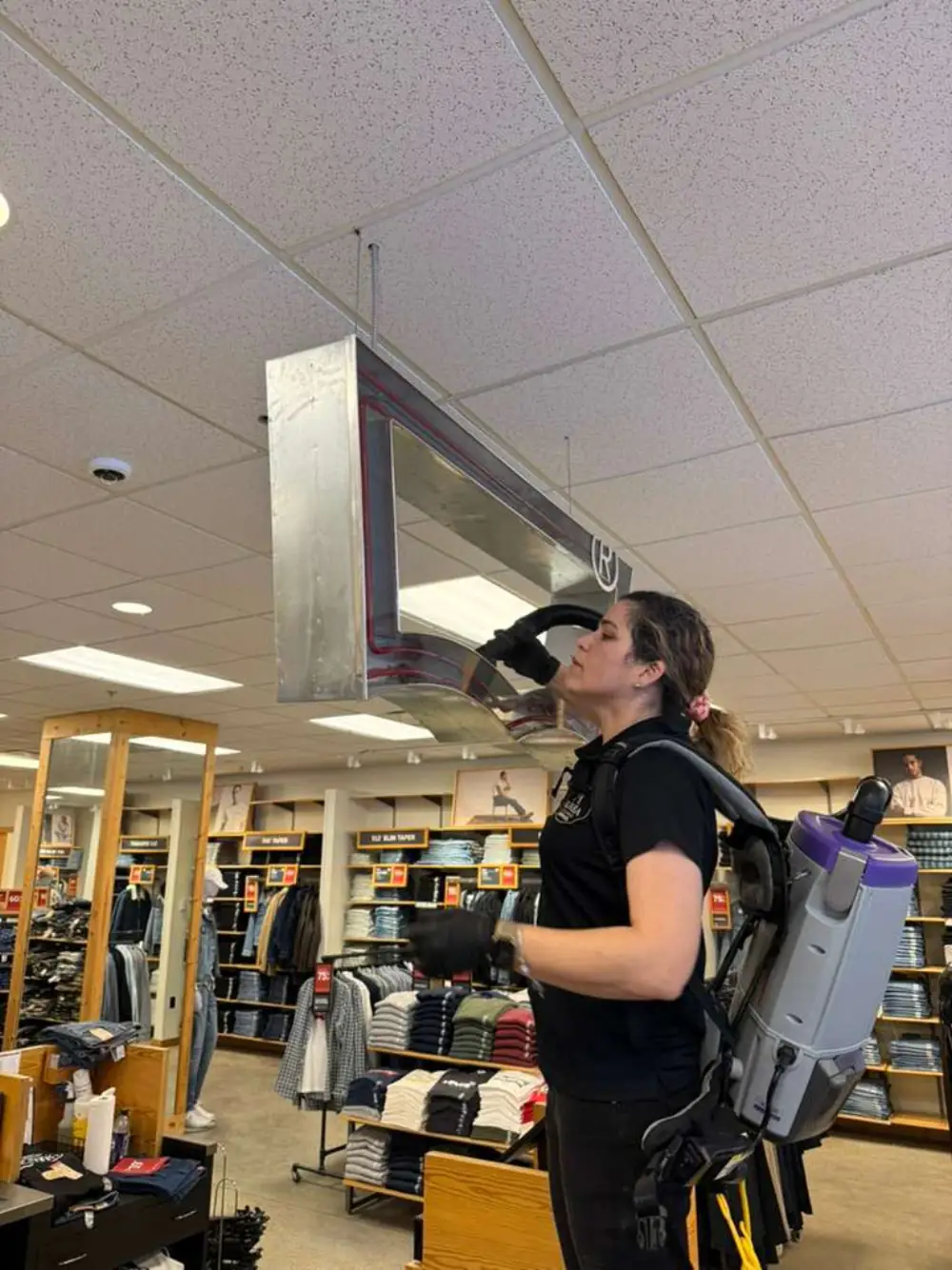 Aurea team cleaning store vents in Massachusetts